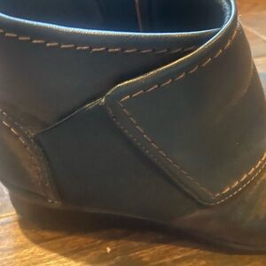 Clark booties rubber wedge heel.
